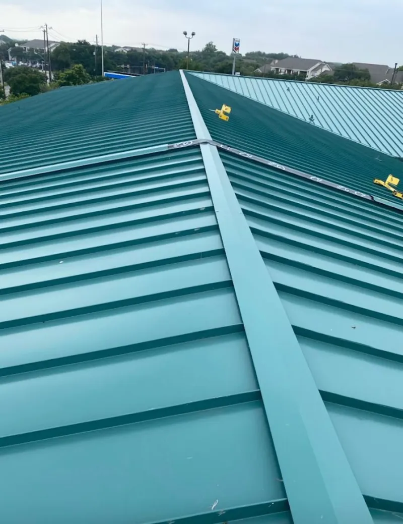 Green commercial metal roof ridge and valley for Metal Roof Repair in Highland Park